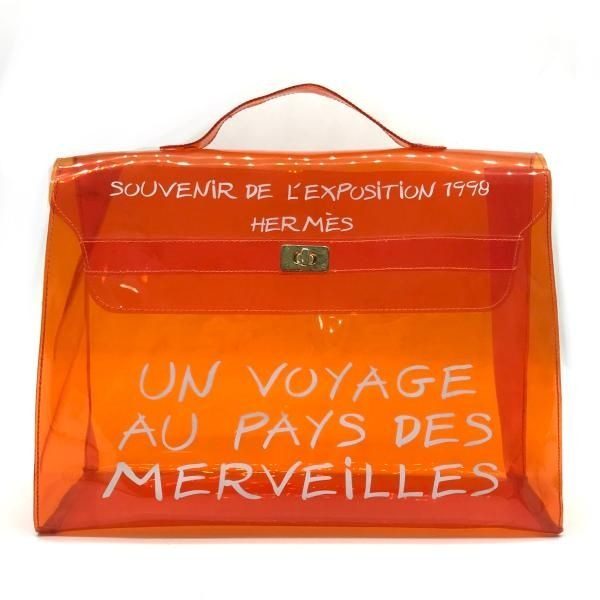 Hermès Vinyl Kelly Orange — The Status Statement